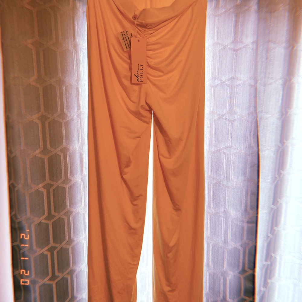 Canary yellow trousers.